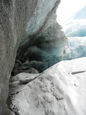 Figure 3. Early season (May) view inside the meltwater portal at the terminus of the Leverett Glacier prior to the onset of extreme melting later in the summer. The Leverett River originates with meltwater that exits this tunnel. Photo courtesy of Matt Charette, WHOI.