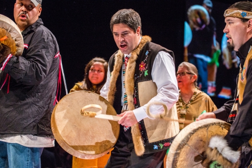 Evon Peter, Vice Chancellor for Rural, Community and Native Education at UAF, leading a drum dance; UAF Photo by Todd Paris