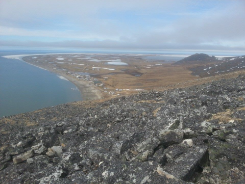 13 June - A small strip of landfast ice north of Wales. Image taken from atop Cape Mountain looking north. 