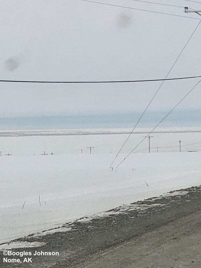 View from the first hill off the coast looking south at the Bering Sea - view 9. Photo courtesy of Boogles Johnson.